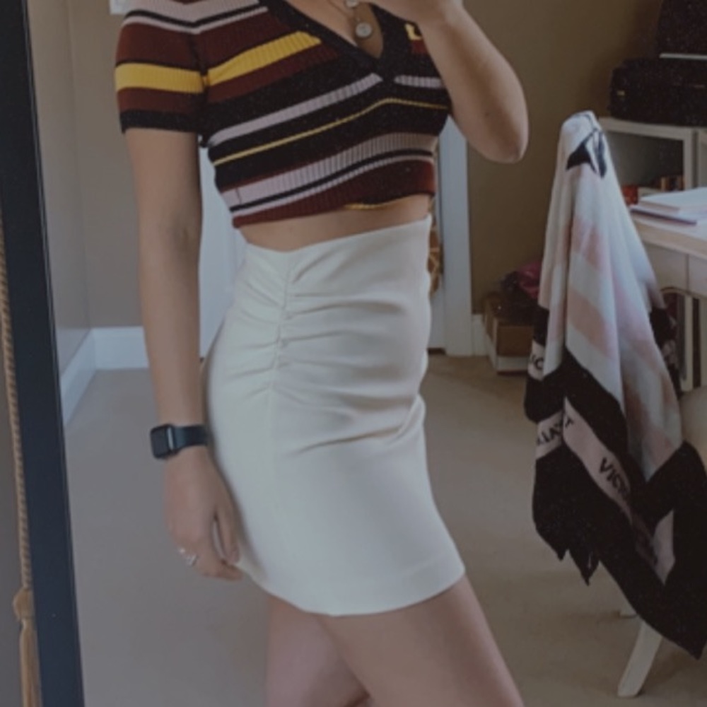Mini skirt with ruched sides